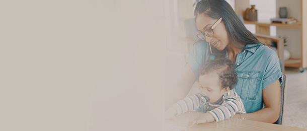 Working mom with baby on her lap