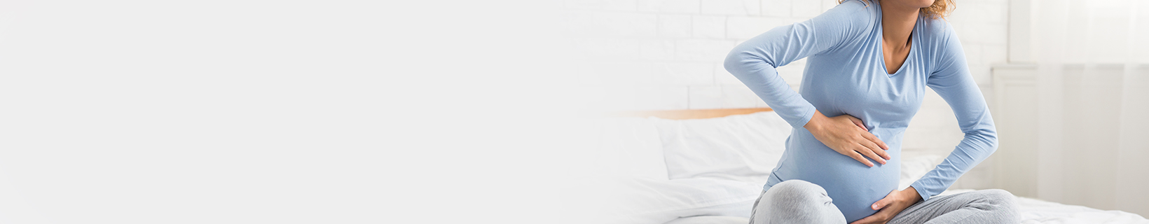 Woman experiencing signs of labour